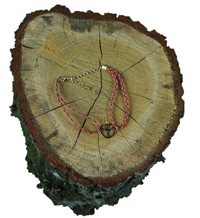 Bracelet tress&eacute; avec breloque (1 pc)